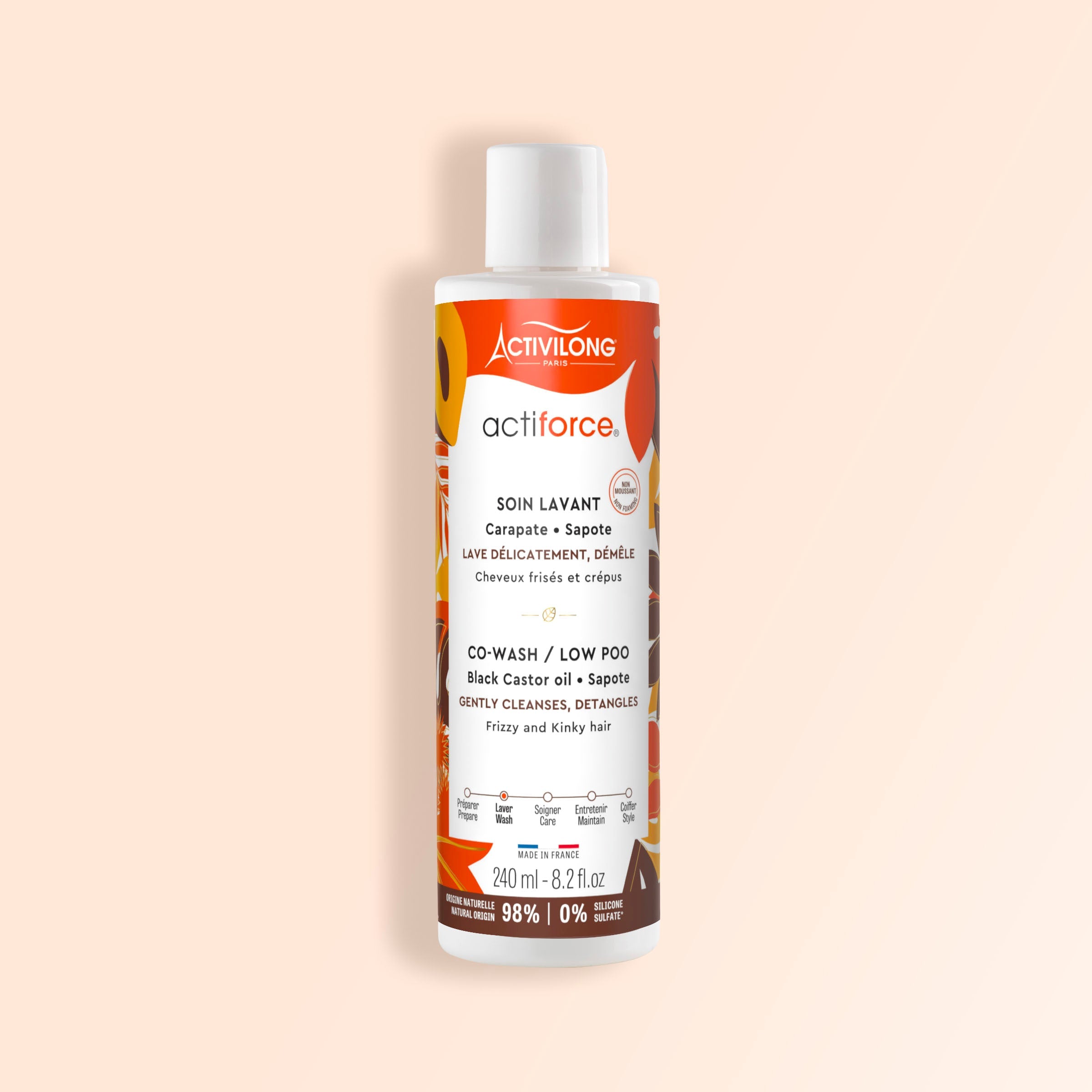 Bottle of ACTIVILONG ACTIFORCE Co-wash 240ml by ABS France Wholesale on a beige background