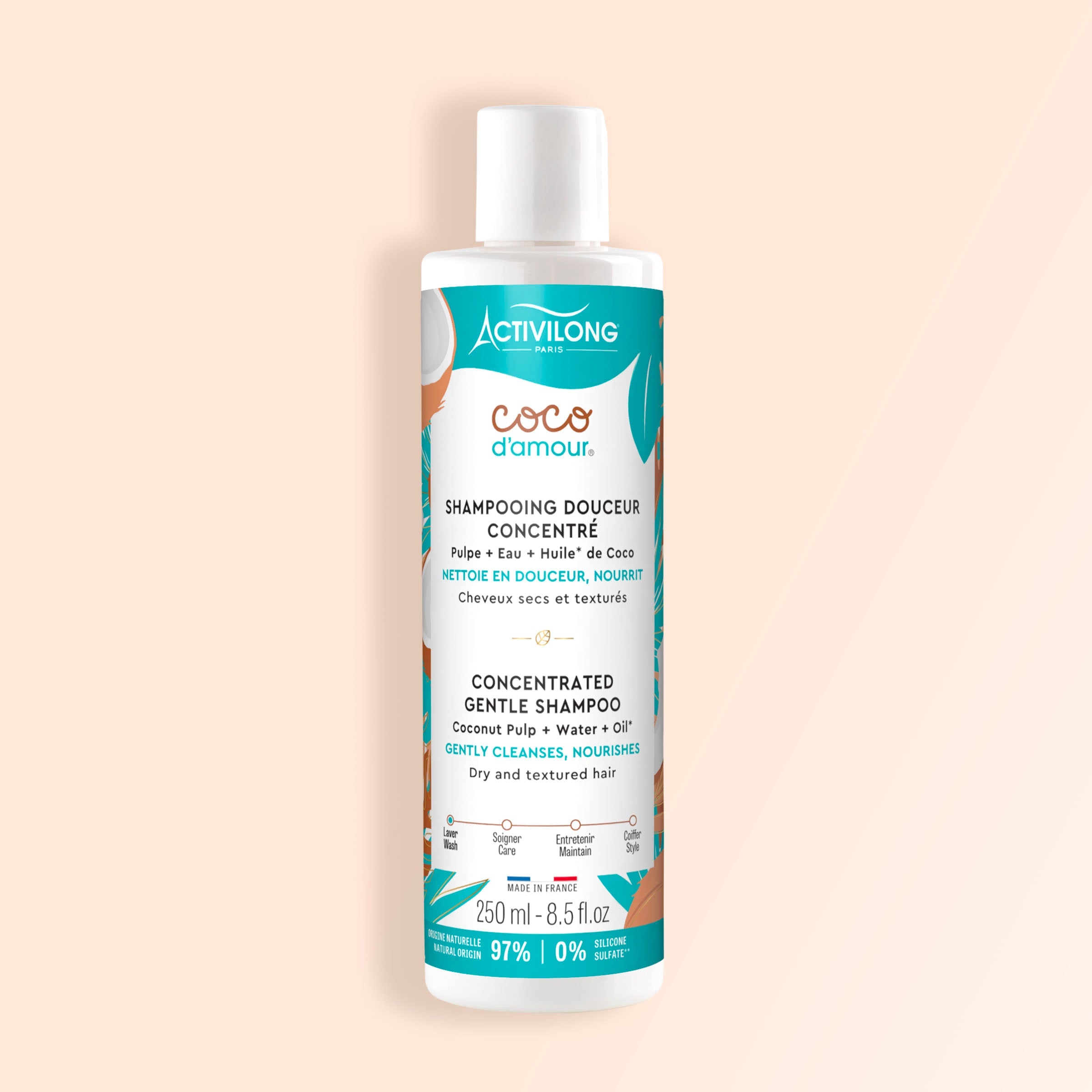 Bottle of ACTIVILONG COCO D’AMOUR Shampooing Douceur 250ml by ABS France Wholesale on a beige background