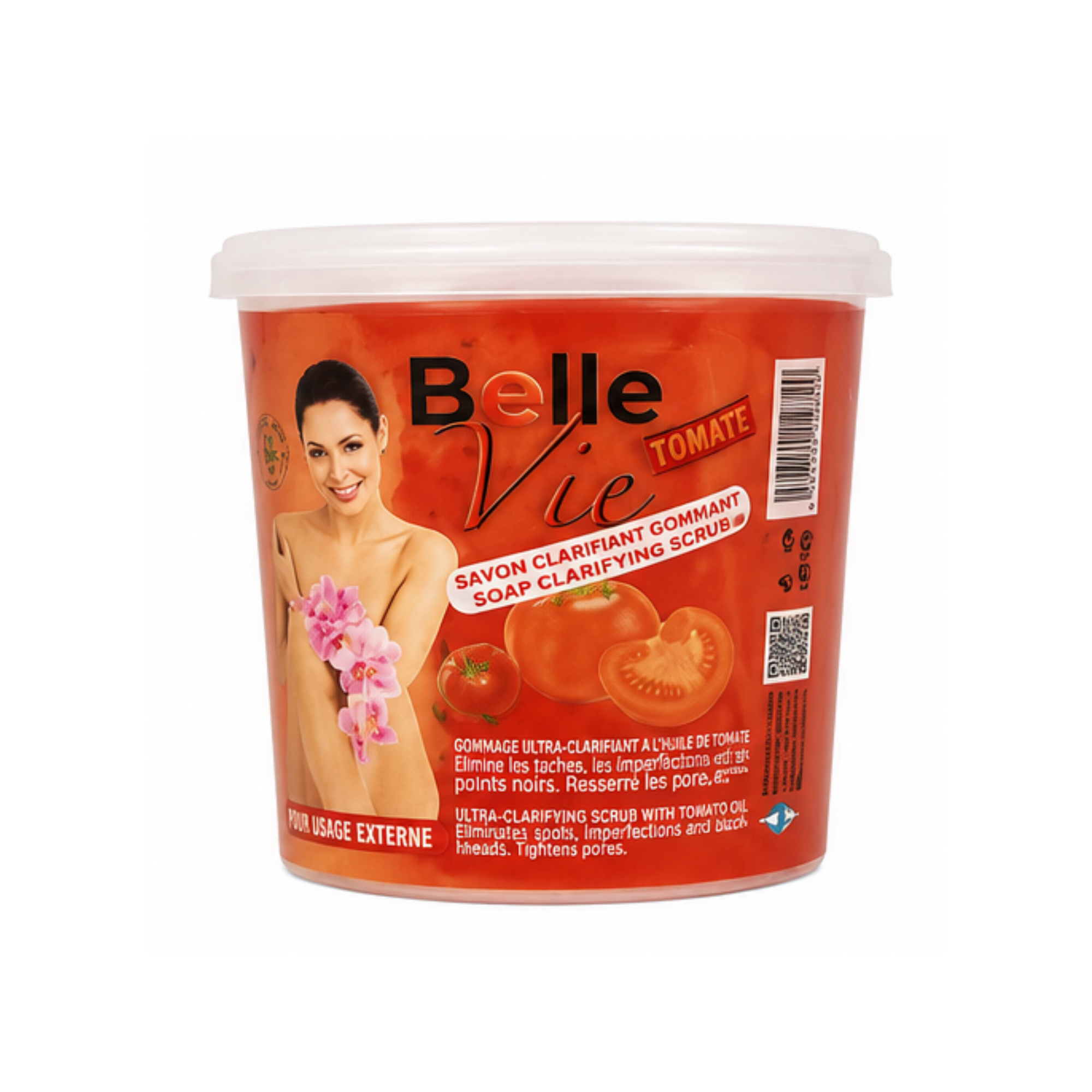 A jar of Belle Vie Tomate Clarifying Soap on a plain white background. The container is orange with a white lid, featuring a label with a woman holding pink flowers, tomatoes, and product text by ABS France Wholesale.