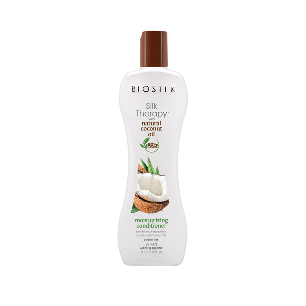 Biosilk Silk Therapy natural coconut oil moisturizing conditioner in a white bottle with a brown cap, shown on a plain white background.