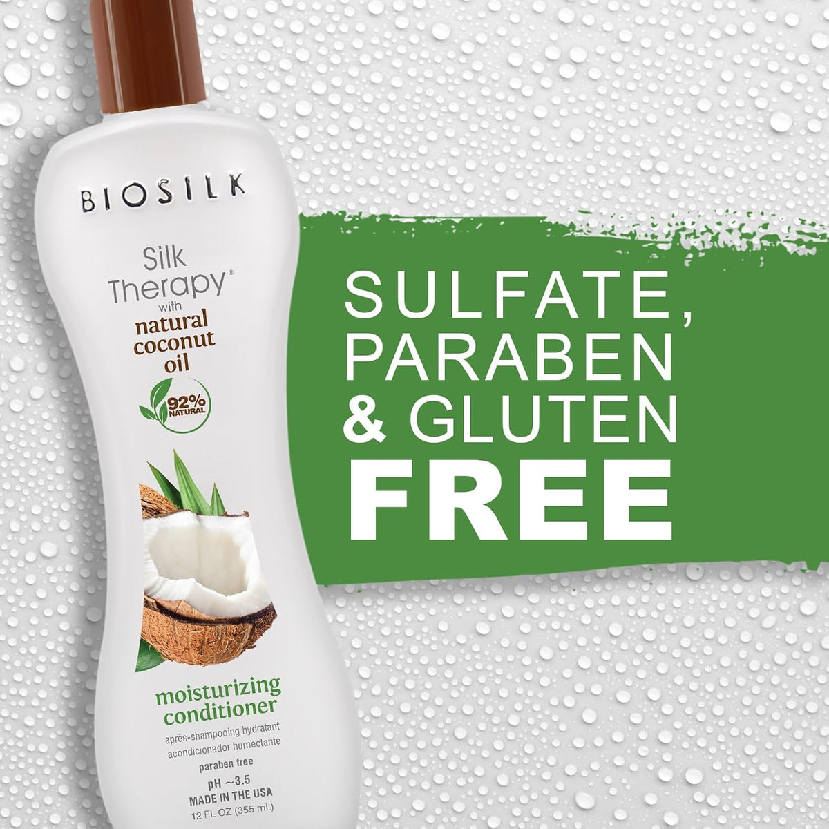 BioSilk Silk Therapy natural coconut oil conditioner bottle with sulfate, paraben, and gluten free text on a textured background.