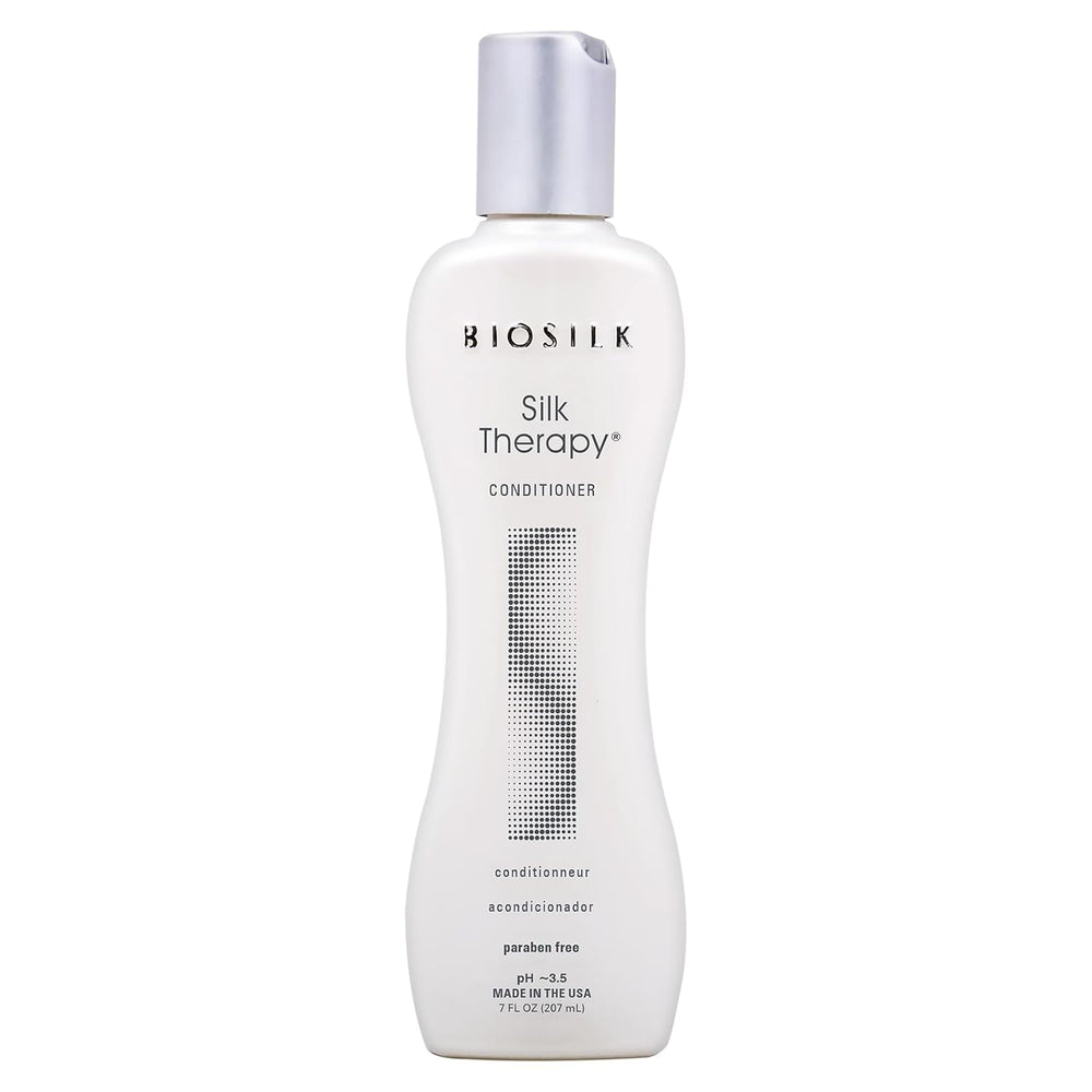 Biosilk Silk Therapy Conditioner in a white bottle with a silver cap, shown against a plain white background.