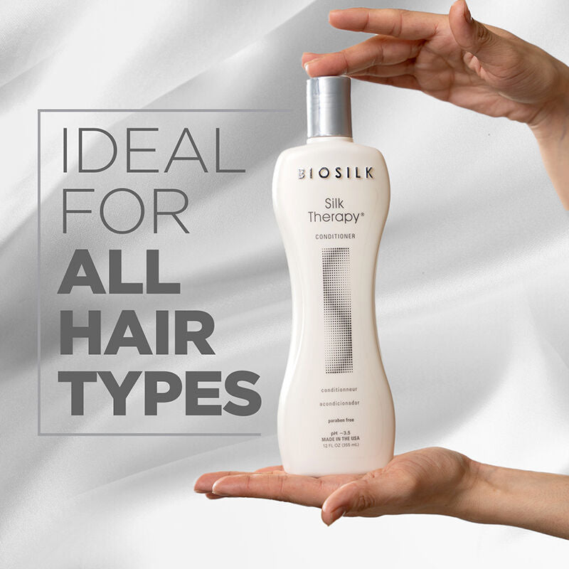 Biosilk Silk Therapy conditioner bottle held by a hand with promotional text on a light gray background
