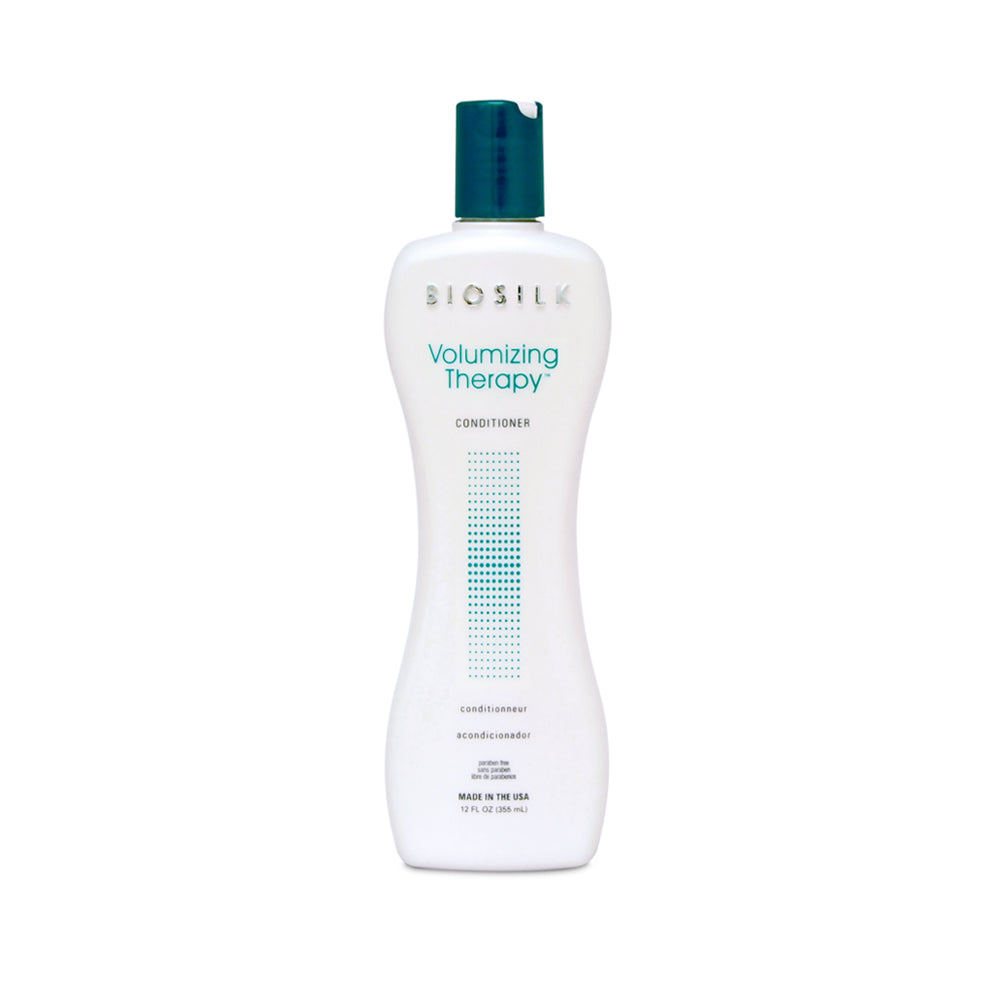 Biosilk Volumizing Therapy Conditioner in a white bottle with a dark teal cap, shown on a plain white background.