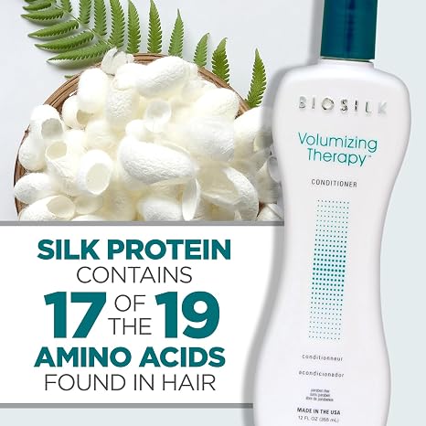 Biosilk Volumizing Therapy Conditioner bottle with text about silk protein and amino acids on a light background.