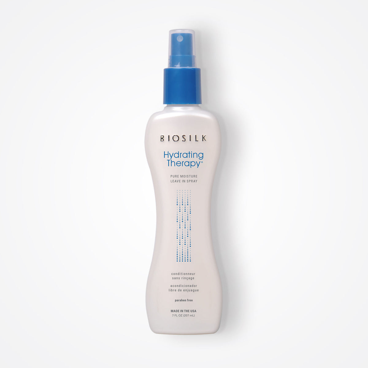 A bottle of BioSilk Hydrating Therapy Fine Moisture Leave-In Spray on a clean white background. The bottle is white with a blue spray nozzle and blue text accents.