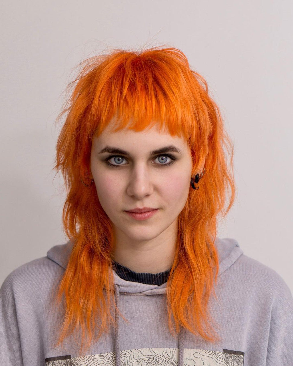 Crazy Color's person with orange hair color by ABS France Wholesale