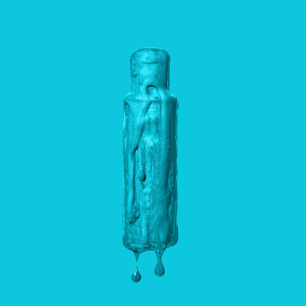 Crazy Color Blue Jade 67 hair dye bottle by ABS France Wholesale on a solid teal background