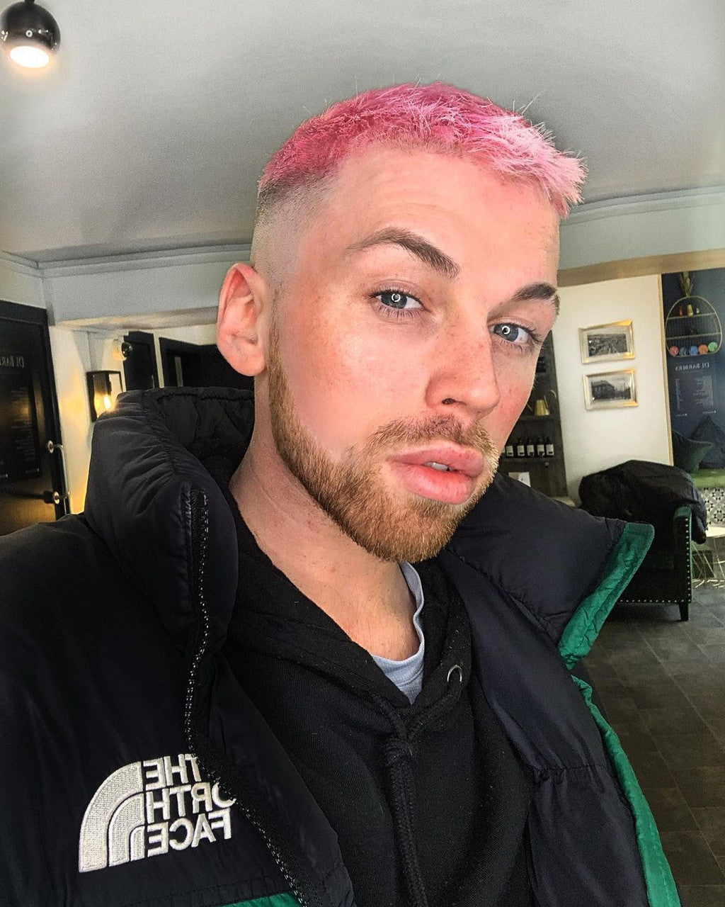 Crazy Color's Person with pink hair wearing a black jacket indoors by ABS France Wholesale
