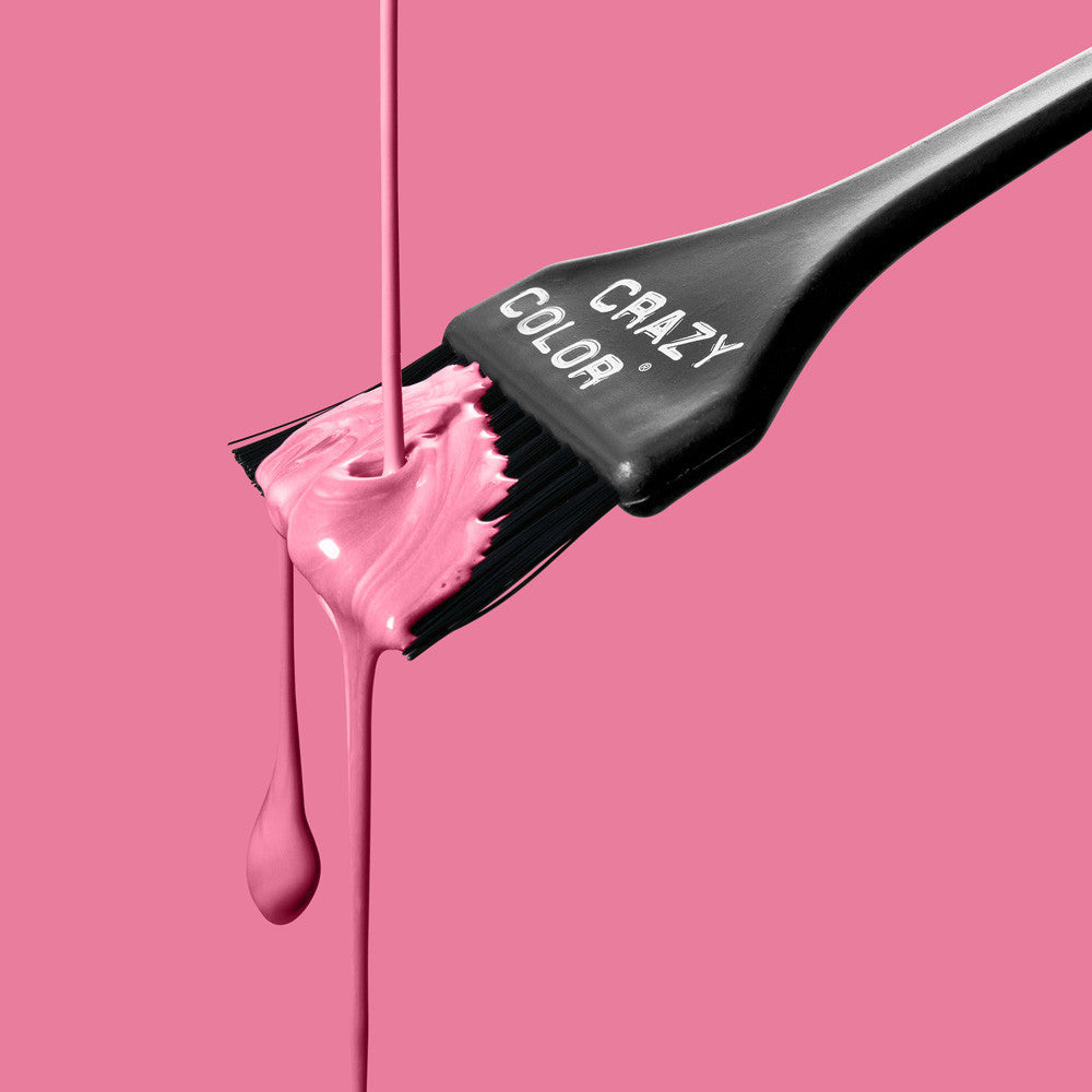Hair color brush with Crazy Color Candy Floss 65 dye on a pink background, featuring the brand 'Crazy Color' by ABS France Wholesale