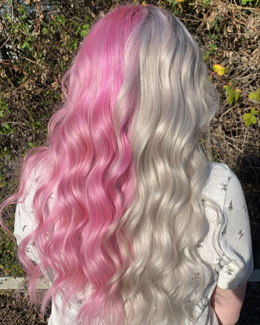 Crazy Color's Person with pink and silver hair standing outdoors by ABS France Wholesale