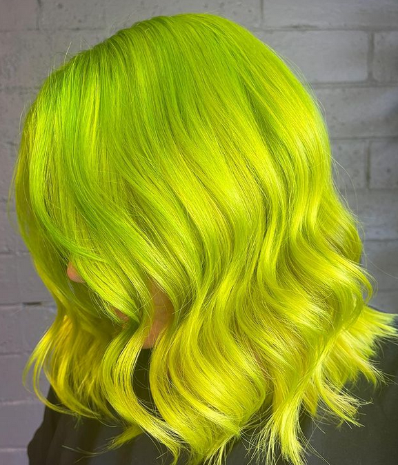 Crazy Color's person with bright green hair by ABS France Wholesale
