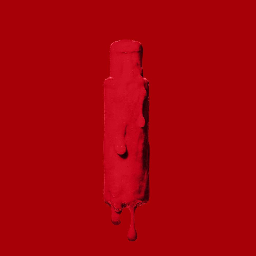Bottle of Crazy Color Fire 56 100ml hair dye by ABS France Wholesale on a red background