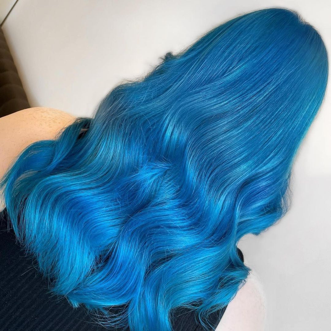 Crazy Color's person with skye blue hair by ABS France Wholesale