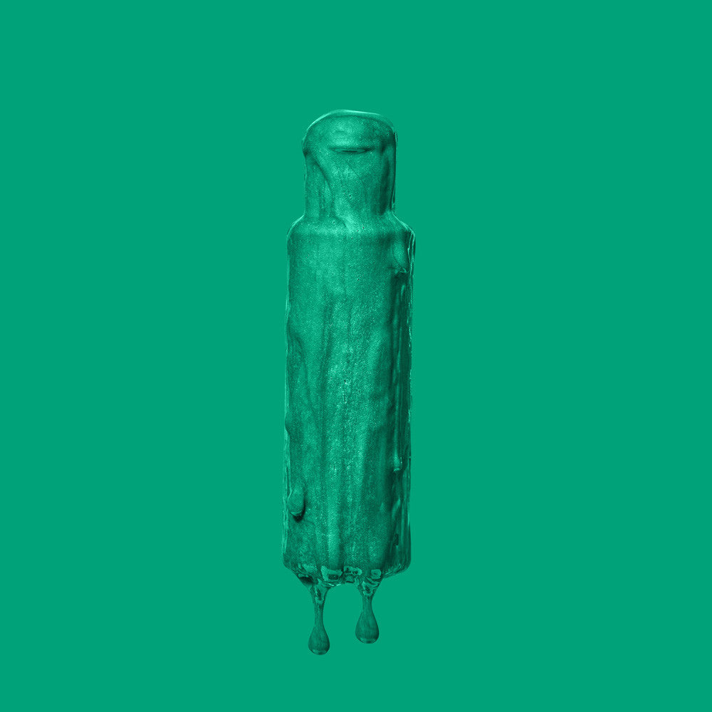 Liquid of Crazy Color Vert Emeraude (Emerald Green) no. 53 100ml hair dye bottle by ABS France Wholesale on a green background