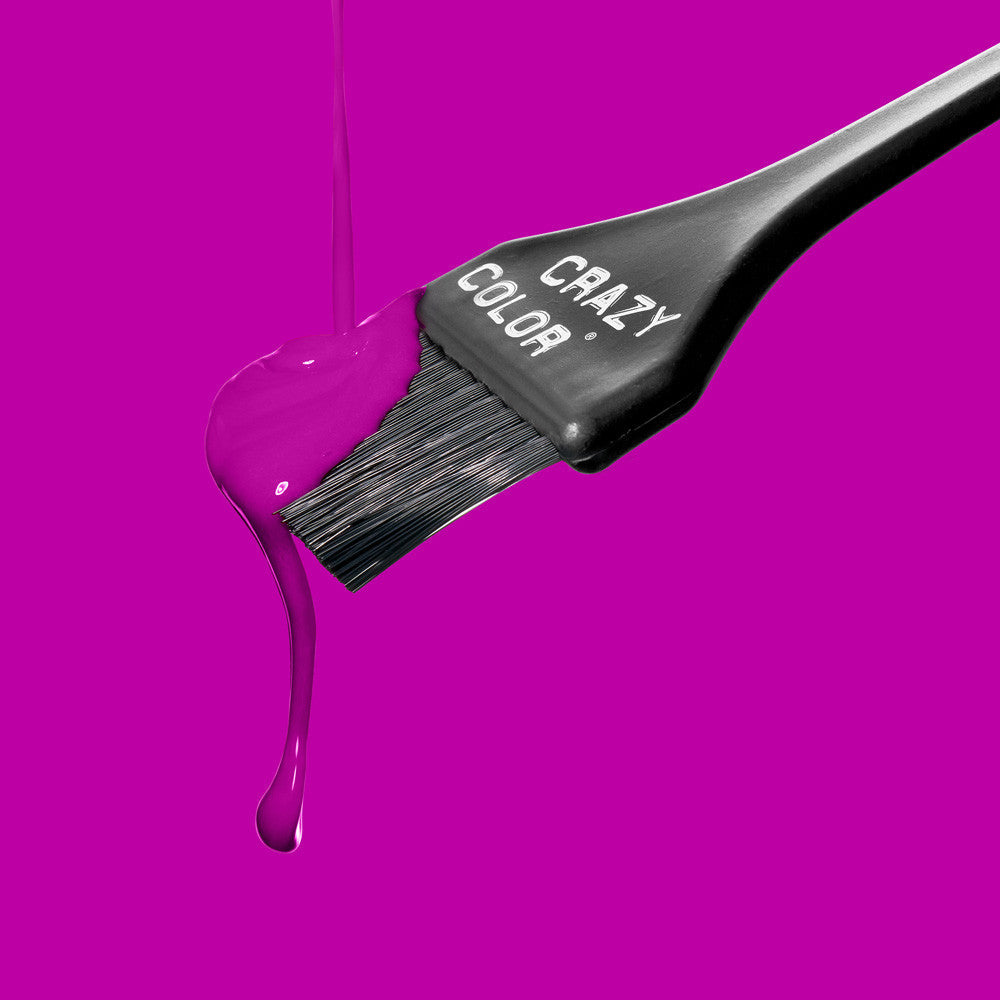 Crazy Color hair dye brush with purple dye By ABS France Wholesale on a pink background