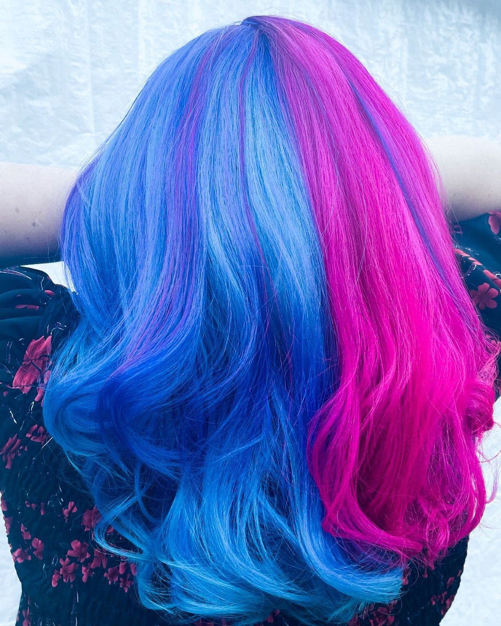 Crazy Color's Person with blue and pink hair against a light background by ABS France Wholesale