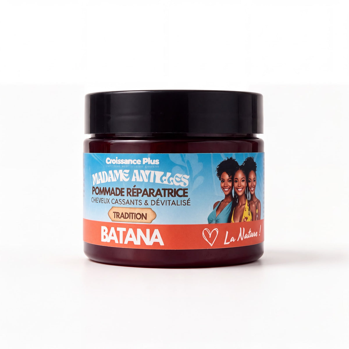 A jar of Batana hair repair pomade by Madame Antiques, featuring a black lid and a colorful label with blue, orange, and white sections, set against a plain white background.