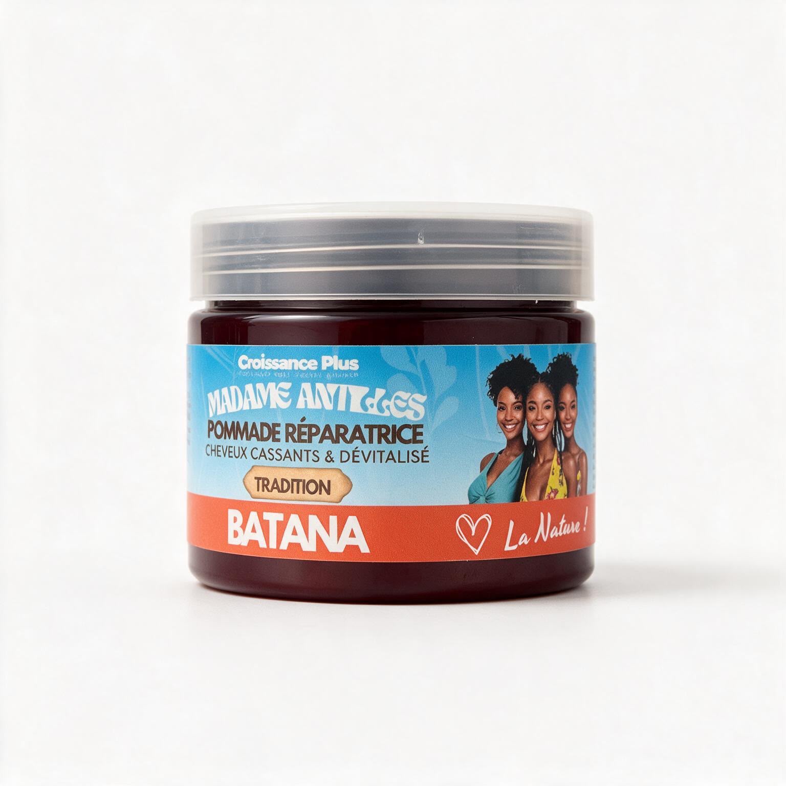 A jar of Croissance Plus Madame Antiques Tradition Batana hair repair pomade, featuring a dark brown container with a blue and orange label, set against a plain white background.