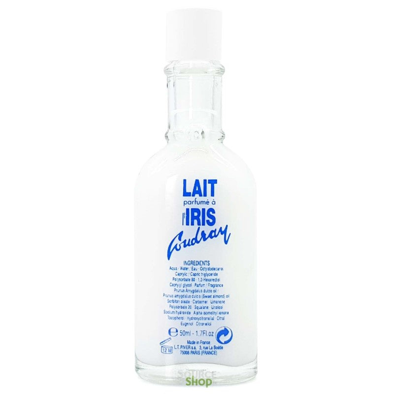 A clear glass perfume bottle with a white label featuring blue text that reads 'LAIT parfumé à l'IRIS Coudray' and '50ml - 1.75 fl.