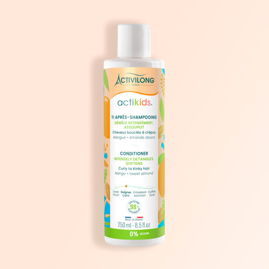 Activilong Actikids conditioner bottle by ABS France Wholesale on a beige background