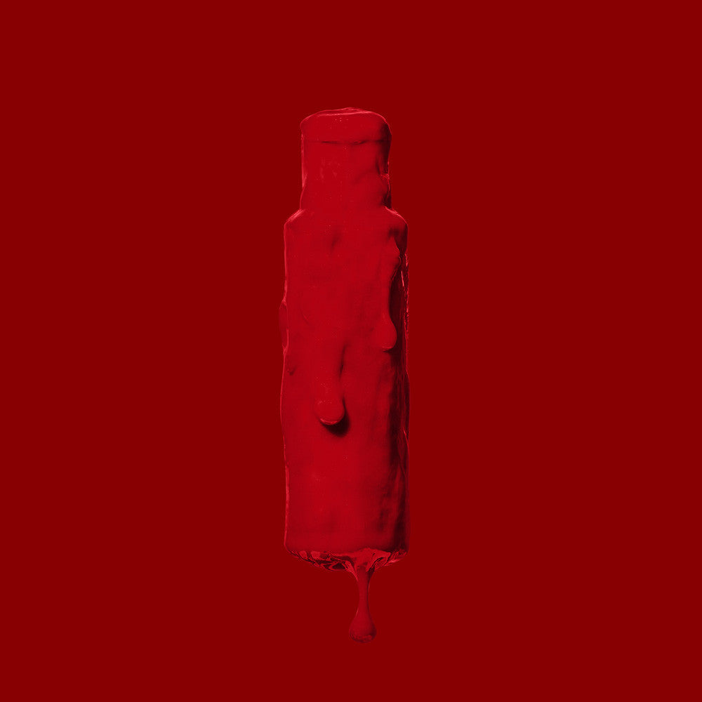 Red liquid bottle on a red background by ABS France Wholesale