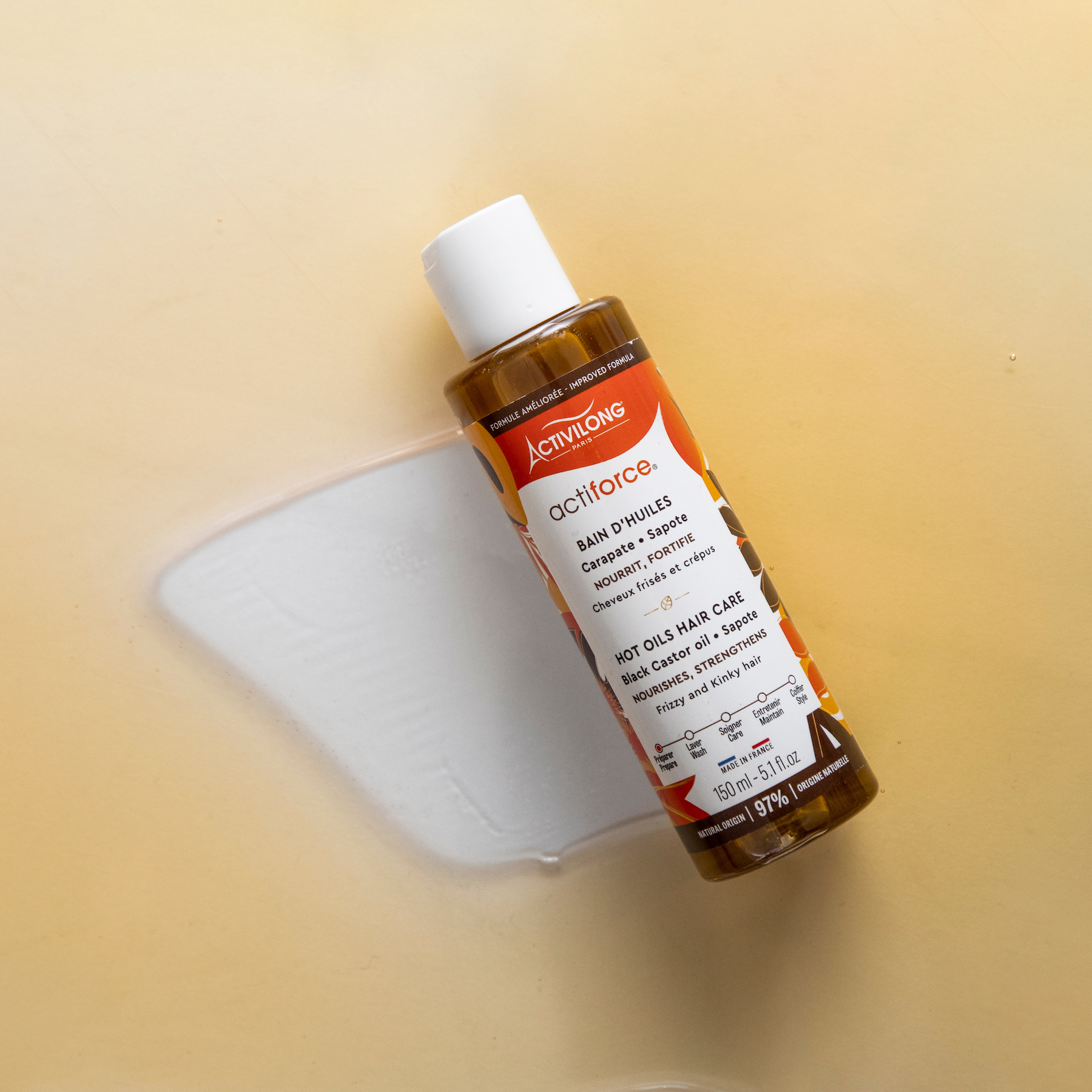 ACTIVILONG ACTIFORCE Bain d'Huile 130ml Bottle by ABS France Wholesale on a blurred background