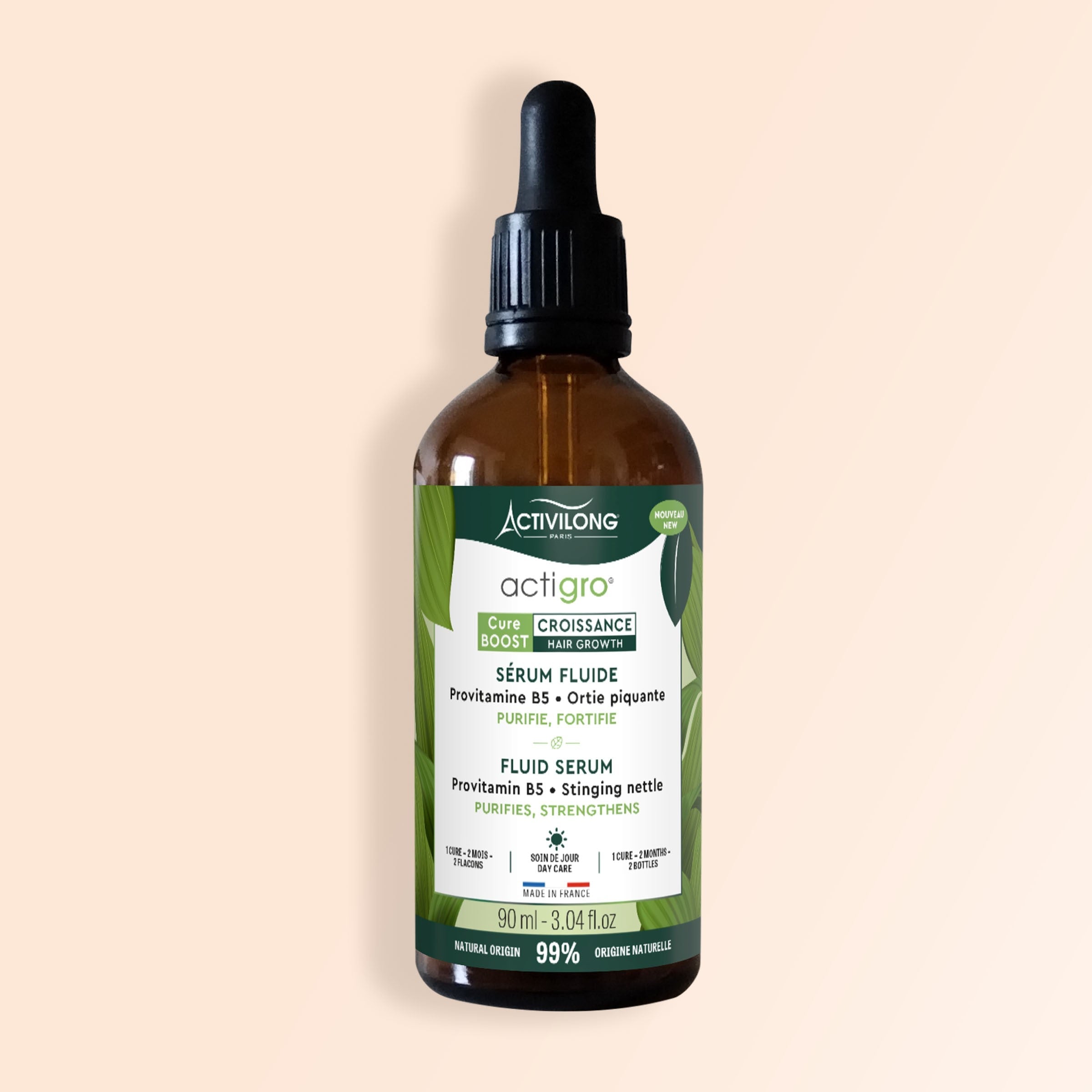 Bottle of ACTIVILONG ACTIGRO Sérum Fluide 90ml by ABS France Wholesale on a beige background