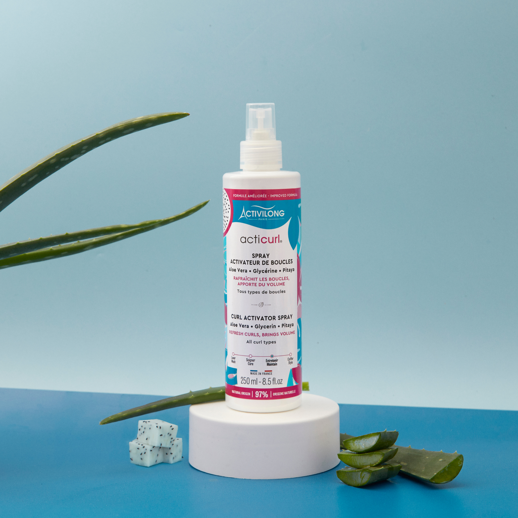 Bottle of ACTIVILONG ACTICURL Spray Activateur 250ml with aloe vera leaves and Pitaya by ABS France Wholesale